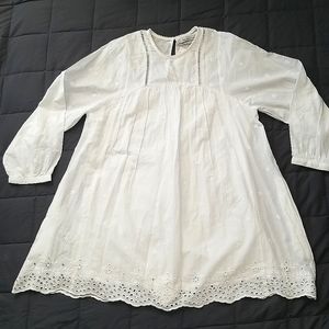 Urban Outfitters Baby Doll-style white eyelet romper. Size M.